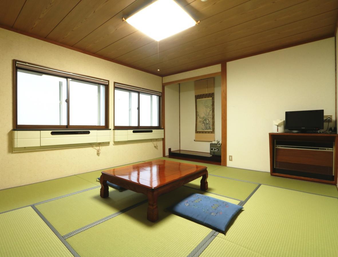 Hakuba Tsugaike Sunrise Tanne Hotel Otari Buitenkant foto