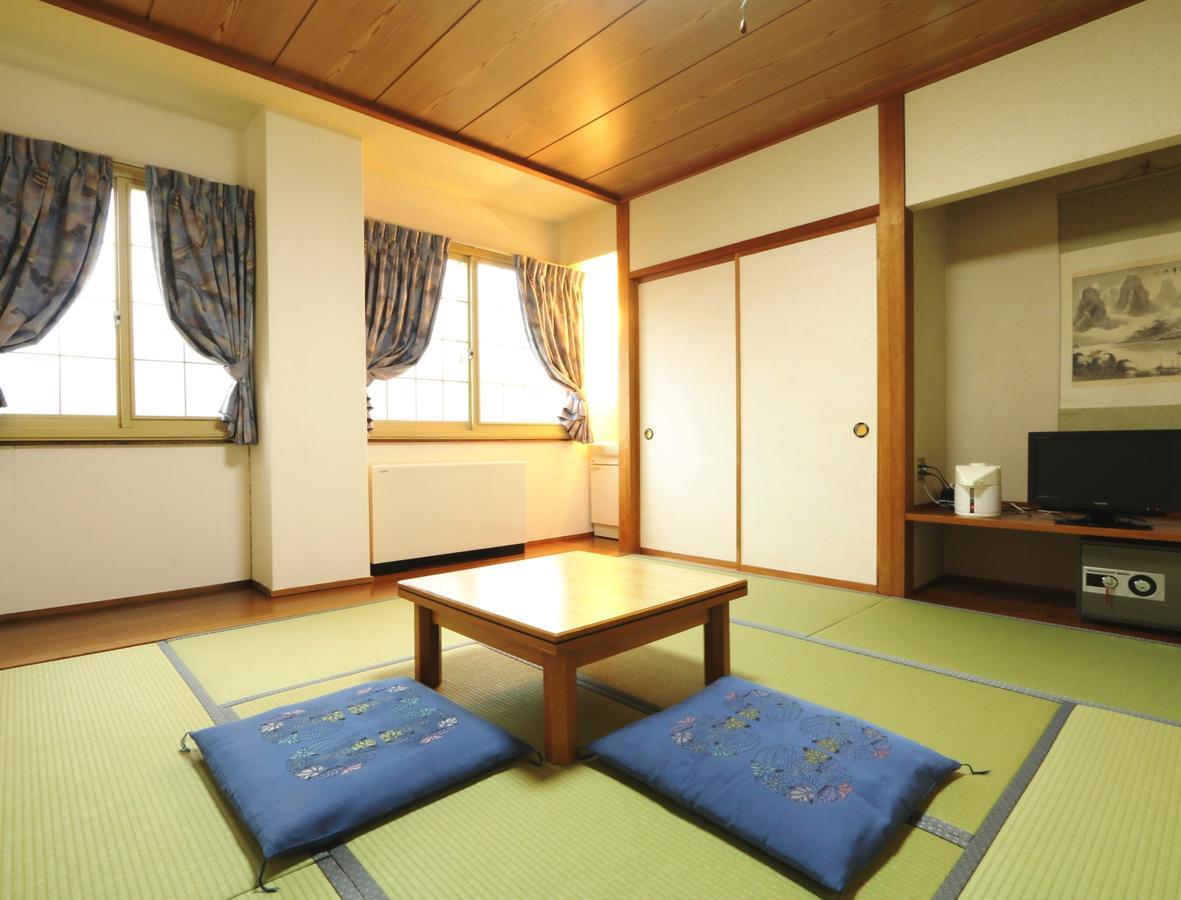 Hakuba Tsugaike Sunrise Tanne Hotel Otari Buitenkant foto